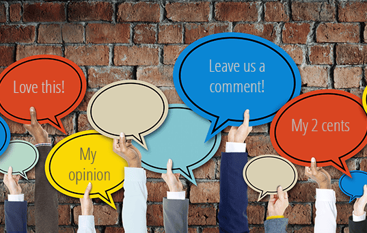 Hands hold up speech balloons that say things like "my opinion" and "leave us a comment!"