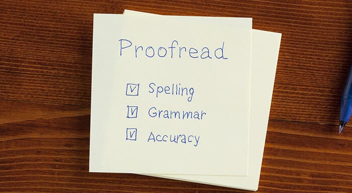 Proofread note with check boxes for spelling, grammar and accuracy.