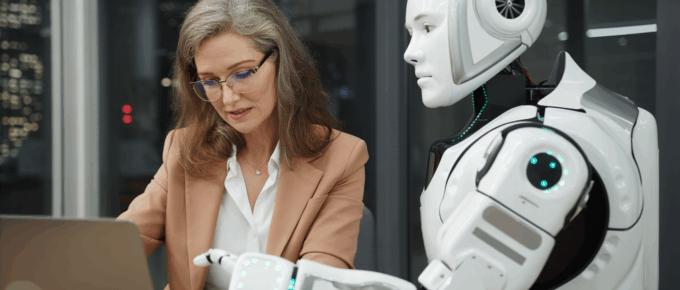 content creator working with a robot, representing ai writing tools